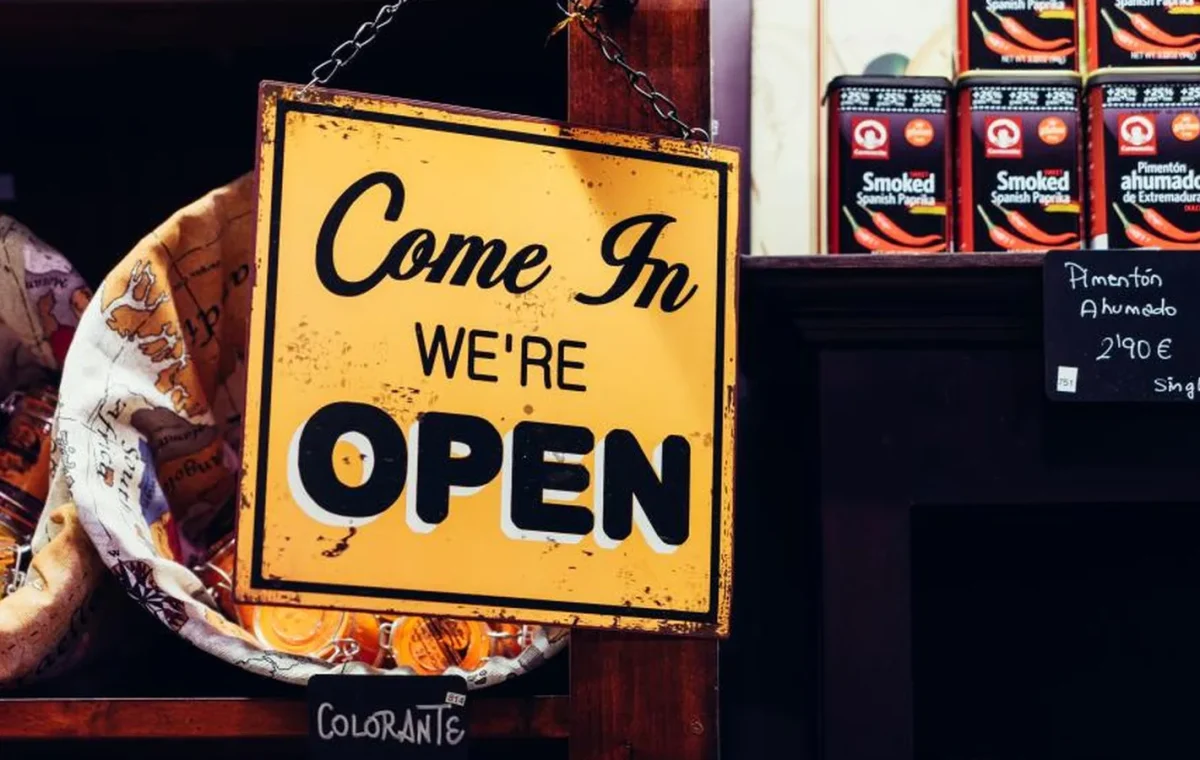 A sign on a shop door reading Come in, we are open