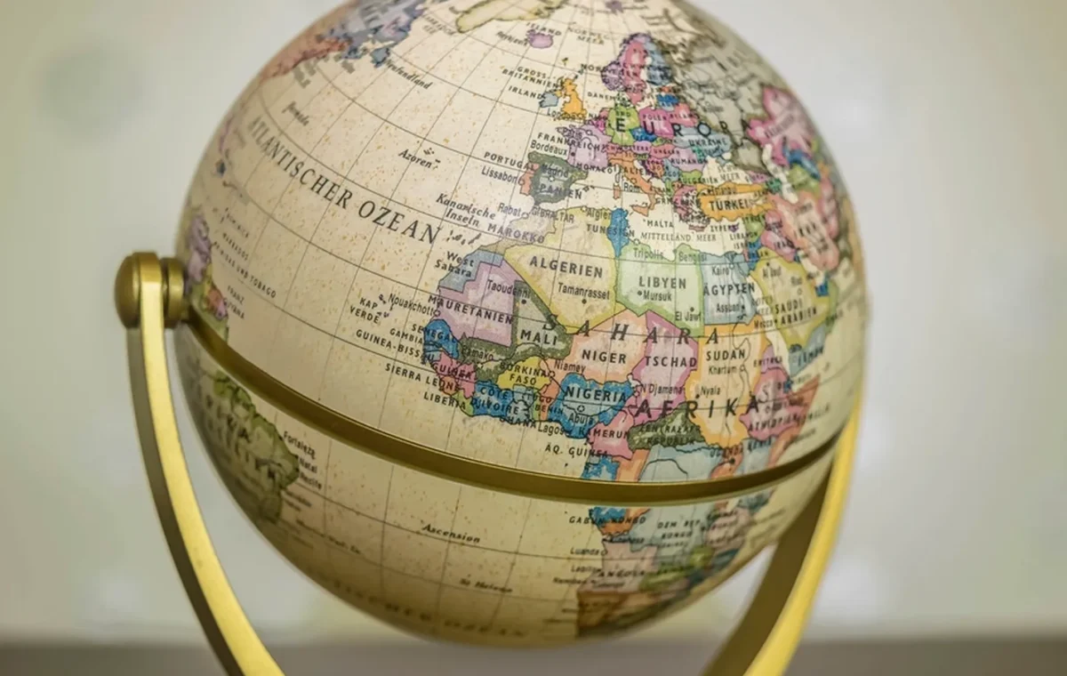 A globe on a brass stand